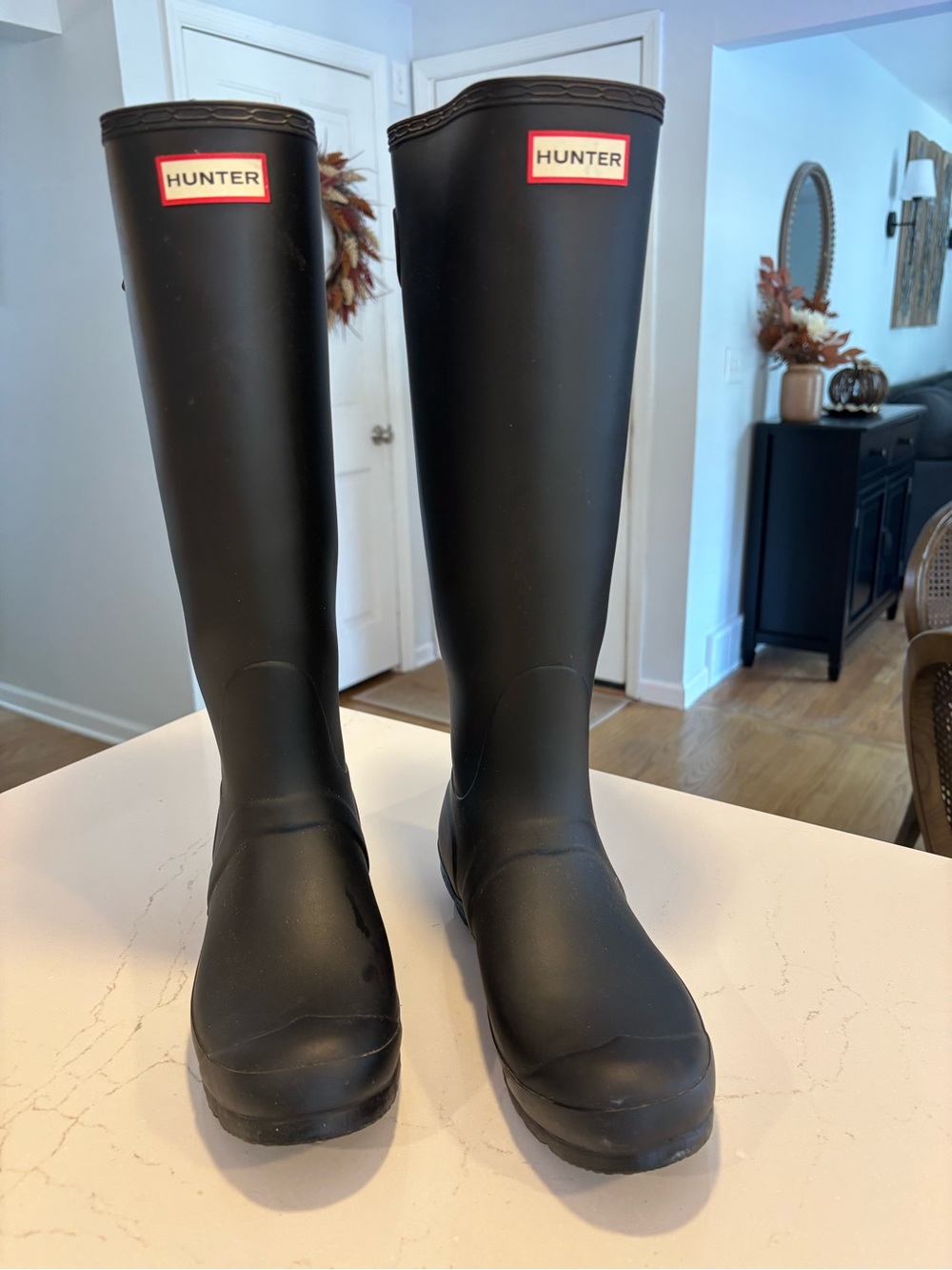 Hunter women’s Matte Black Tall Waterproof Rain Boots with fleece socks